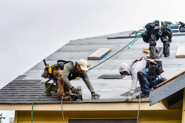 Professional Storm Damage Roof Repair technician working in Brookfield, CT